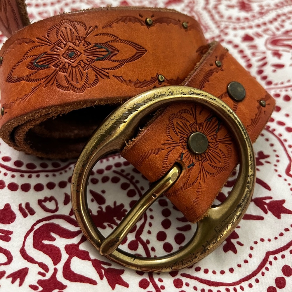 Brown leather Lucky Brand belt with brass buckle and detailed design